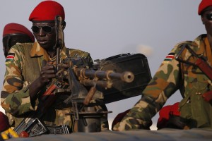 SPLA soldiers stand in a vehicle in Juba