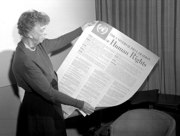 Mrs. Eleanor Roosevelt of the United States holding a Declaration of Human Rights poster. November 1949