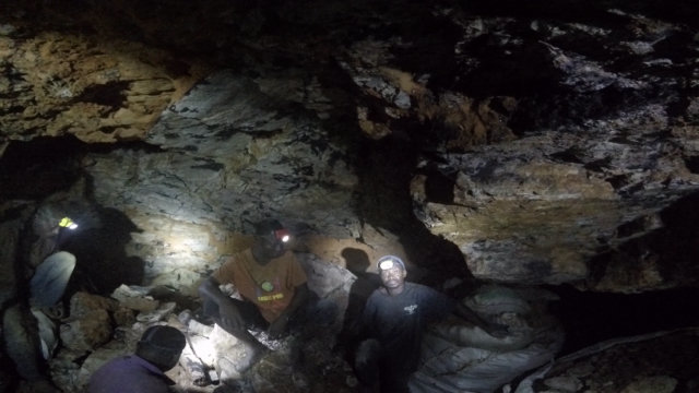 ￼The head torches of the miners light up the pits where they dig for cobalt tens of metres below Kasulo, where residents and miners have dug hundreds of pits to extract this valuable mineral, May 2015. (Still taken from footage shot by a miner using a GoPro camera for Amnesty International). © Amnesty International and Afrewatch