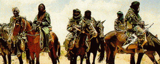 Janjaweed a cavallo fotografati in Darfur qualche anno fa