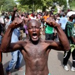 A man gestures as he celebrates in Bujumbura, Burundi