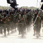 File photo of new recruits belonging to the al Shabaab militant group marching during a passing out parade at a military training base in Afgoye
