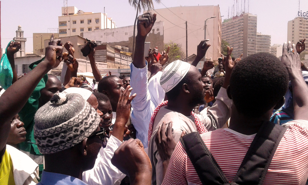 Supporters of some of the accused outside the Dakar courthouse after the verdicts were delivered.