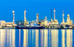 Oil refinery with the blue sky background